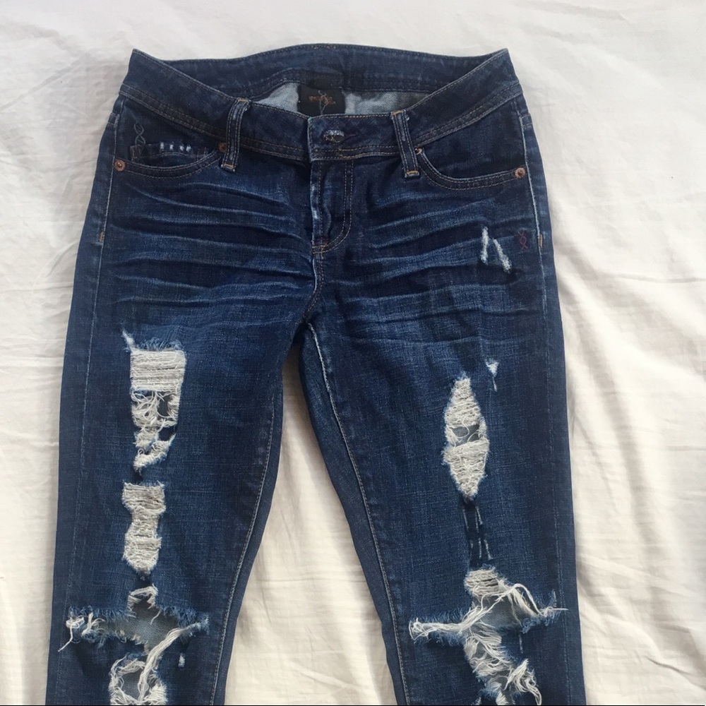 Torn Distressed Skinny Jeans